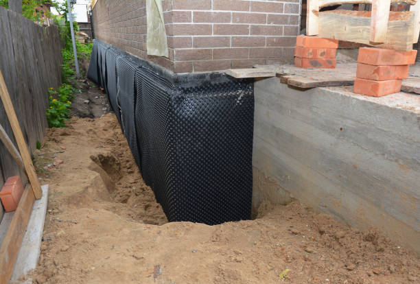 SJ Waterproofing Pros technician performing targeted Sump Pump Installation assessment in Morristown, IN
